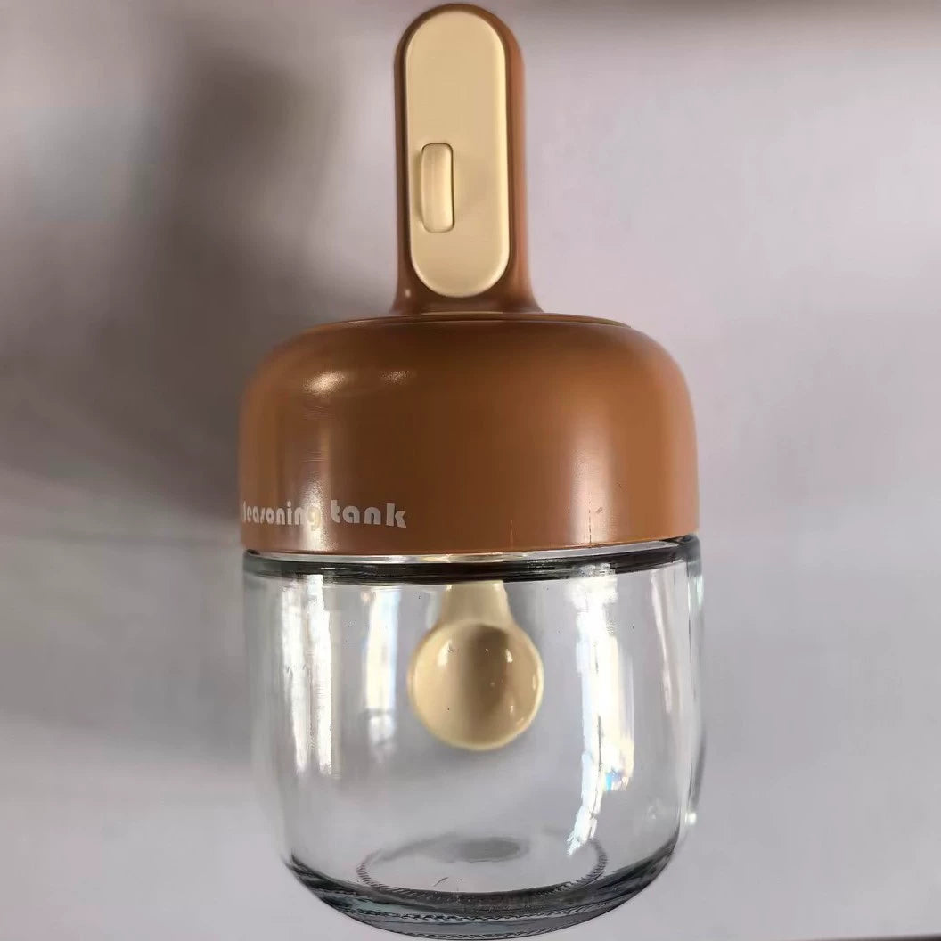 შუშის კონტეინერი კოვზით